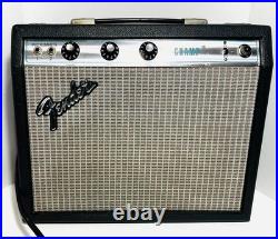 Vintage 1970's Fender Silverface Champ Tube Guitar Amplifier Vintage 1970's Fender Silverface Champ Tube Guitar Amplifier